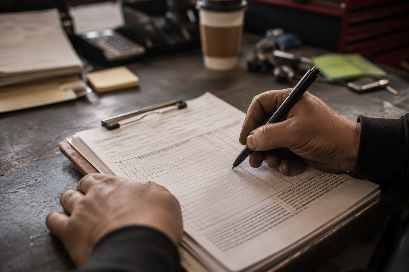 Service paperwork being filled out